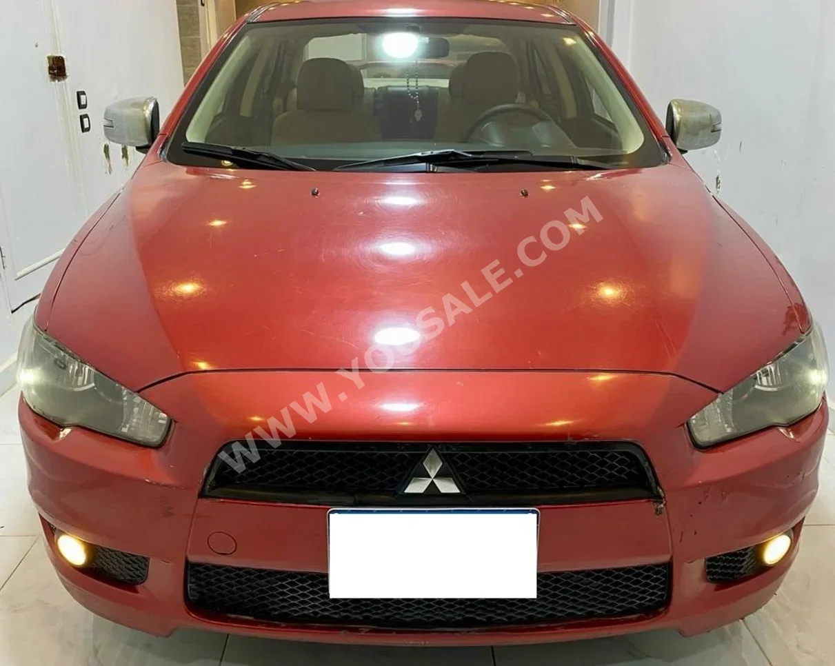 Mitsubishi  Lancer  2015  Sedan  Automatic  4 Cylinder  104,000 Km  FWD  Red  Gasoline