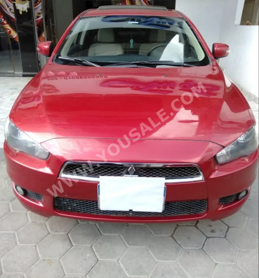 Mitsubishi  Lancer  2016  Sedan  Automatic  Mitsubishi Cylinder  215,000 Km  FWD  Red  Gasoline