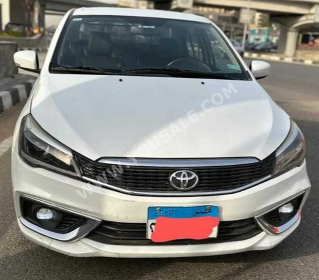 Toyota  Belta  2022  Sedan  Automatic  4 Cylinder  90,000 Km  FWD  White  Gasoline