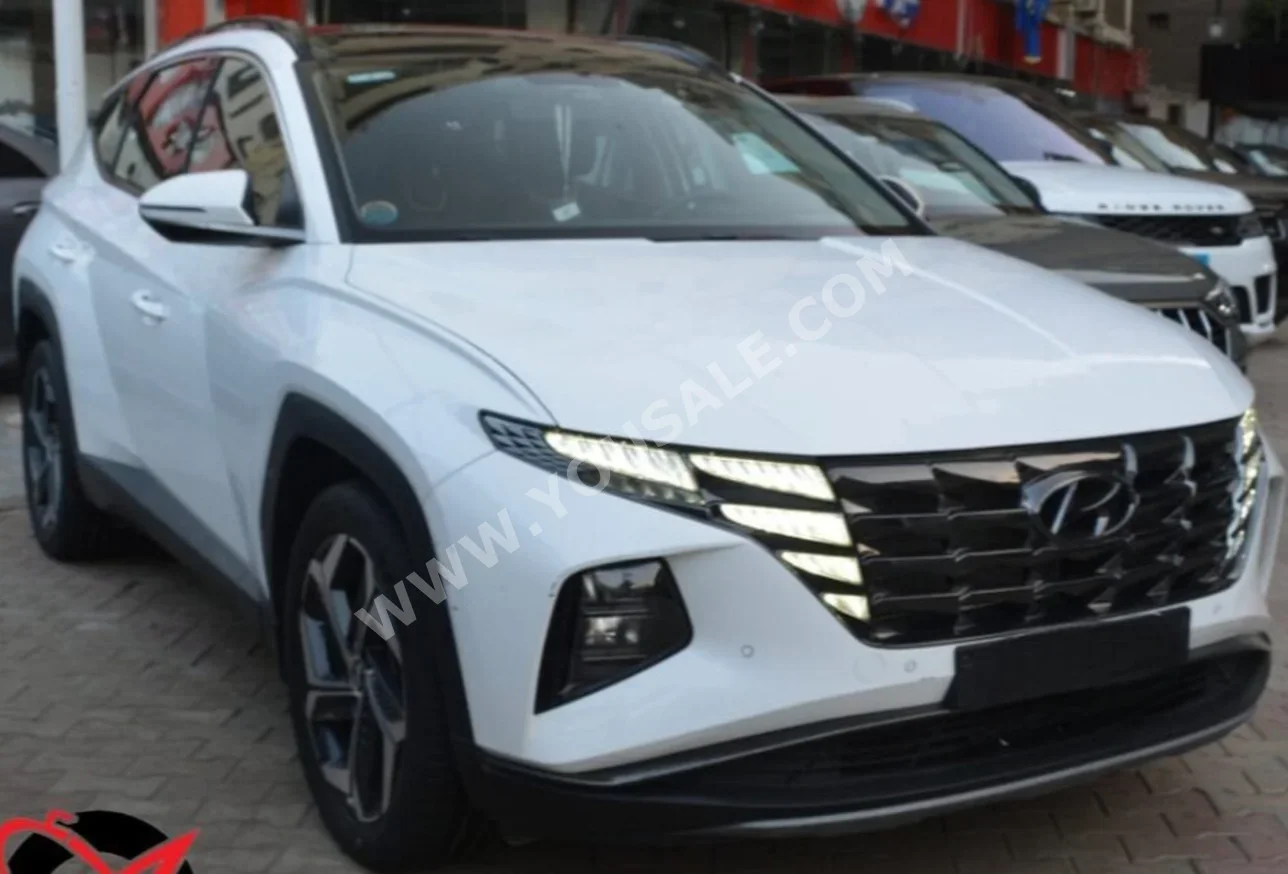 Hyundai  Tucson  2023  SUV  Automatic  4 Cylinder  60,000 Km  FWD  White  Gasoline