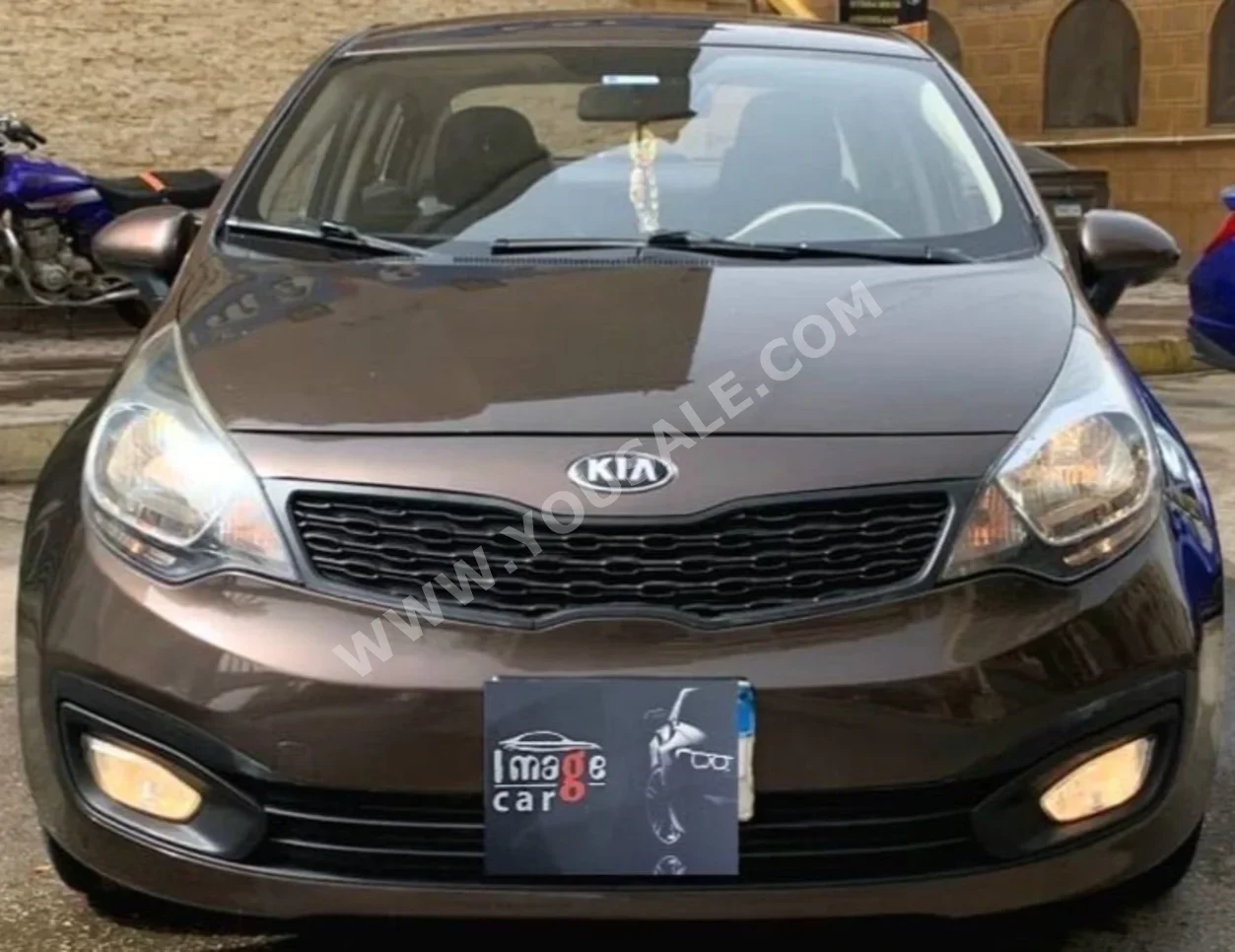 Kia  Rio  2015  Sedan  Automatic  4 Cylinder  150,000 Km  FWD  Brown  Gasoline