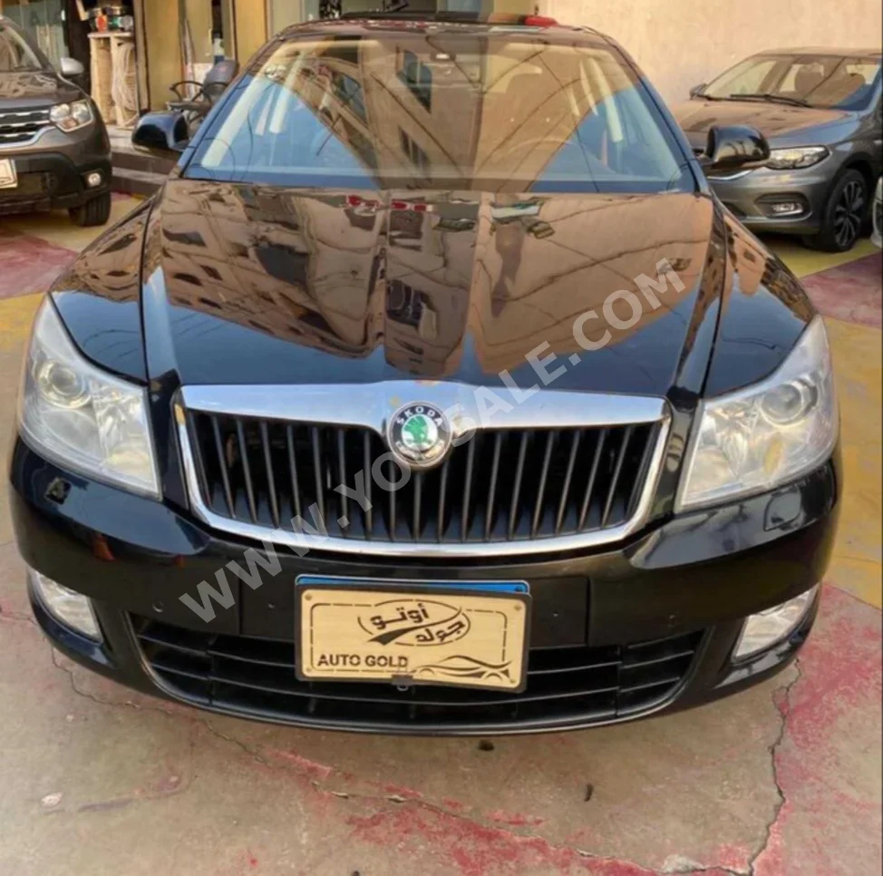 Skoda  Octavia  2010  Sedan  Automatic  4 Cylinder  115,000 Km  FWD  Black  Gasoline