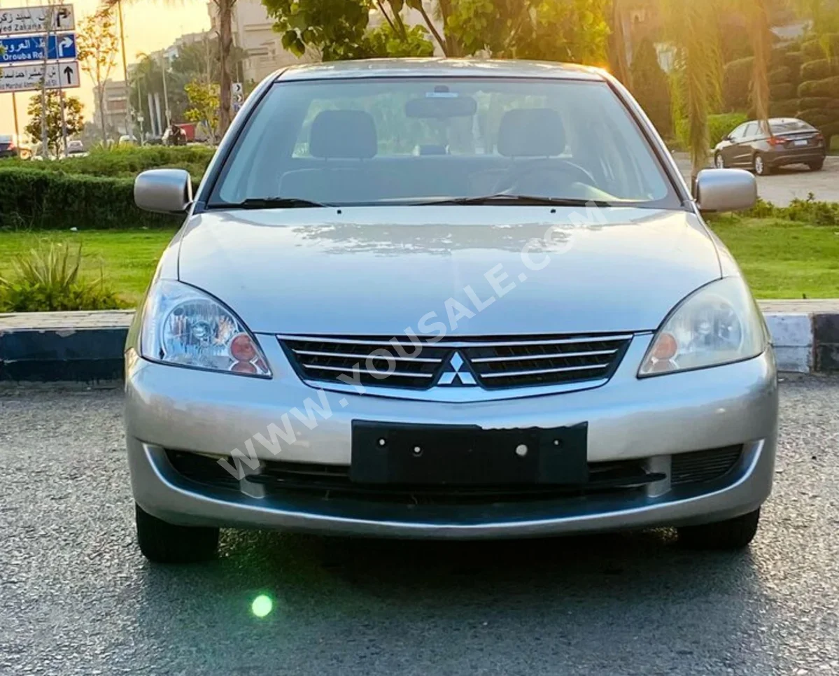 Mitsubishi  Lancer  2011  Sedan  Automatic  4 Cylinder  0 Km  FWD  Silver  Gasoline