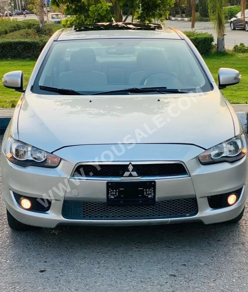 Mitsubishi  Lancer  2016  Sedan  Automatic  4 Cylinder  80,000 Km  FWD  Gold  Gasoline