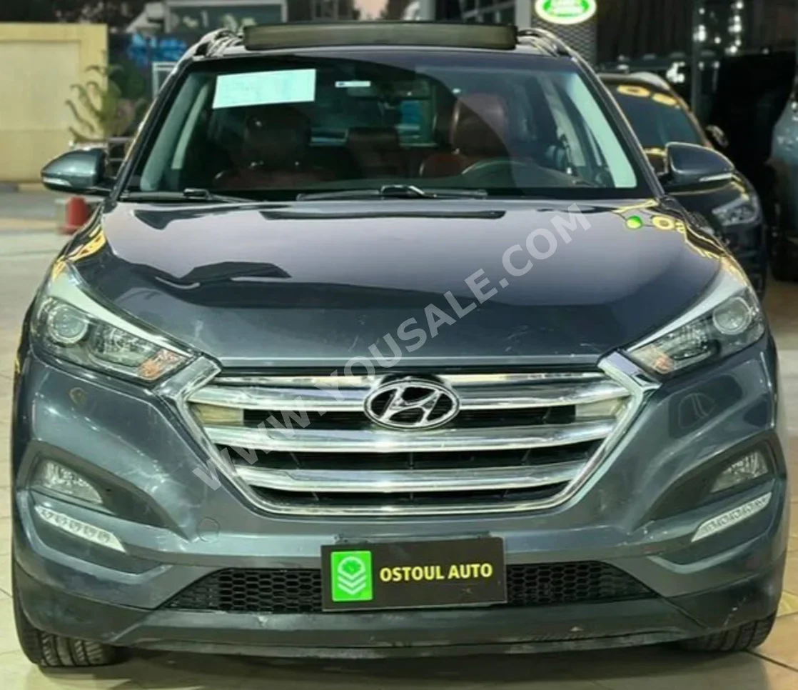 Hyundai  Tucson  2017  SUV  Automatic  4 Cylinder  165,000 Km  FWD  Black  Gasoline