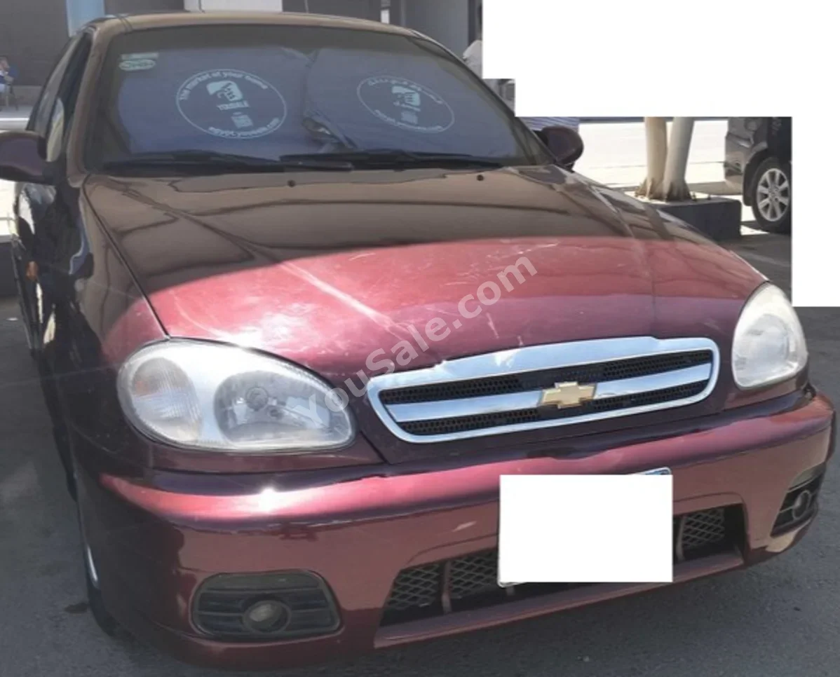 Chevrolet  Lanos  2011  Sedan  Automatic  4 Cylinder  117,000 Km  FWD  Red  Gasoline