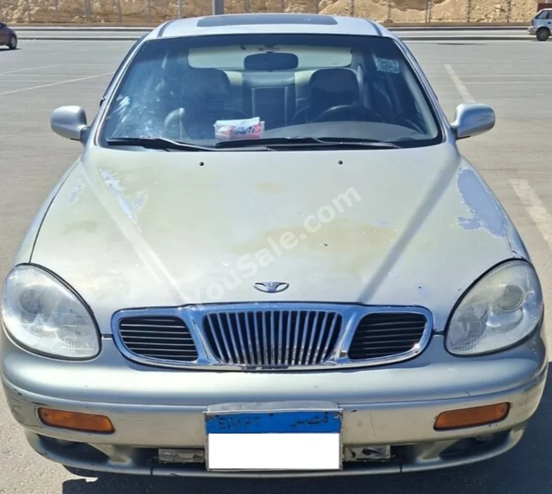 Daewoo  Leganza  2002  Sedan  Automatic  4 Cylinder  180,000 Km  FWD  Silver  Gasoline