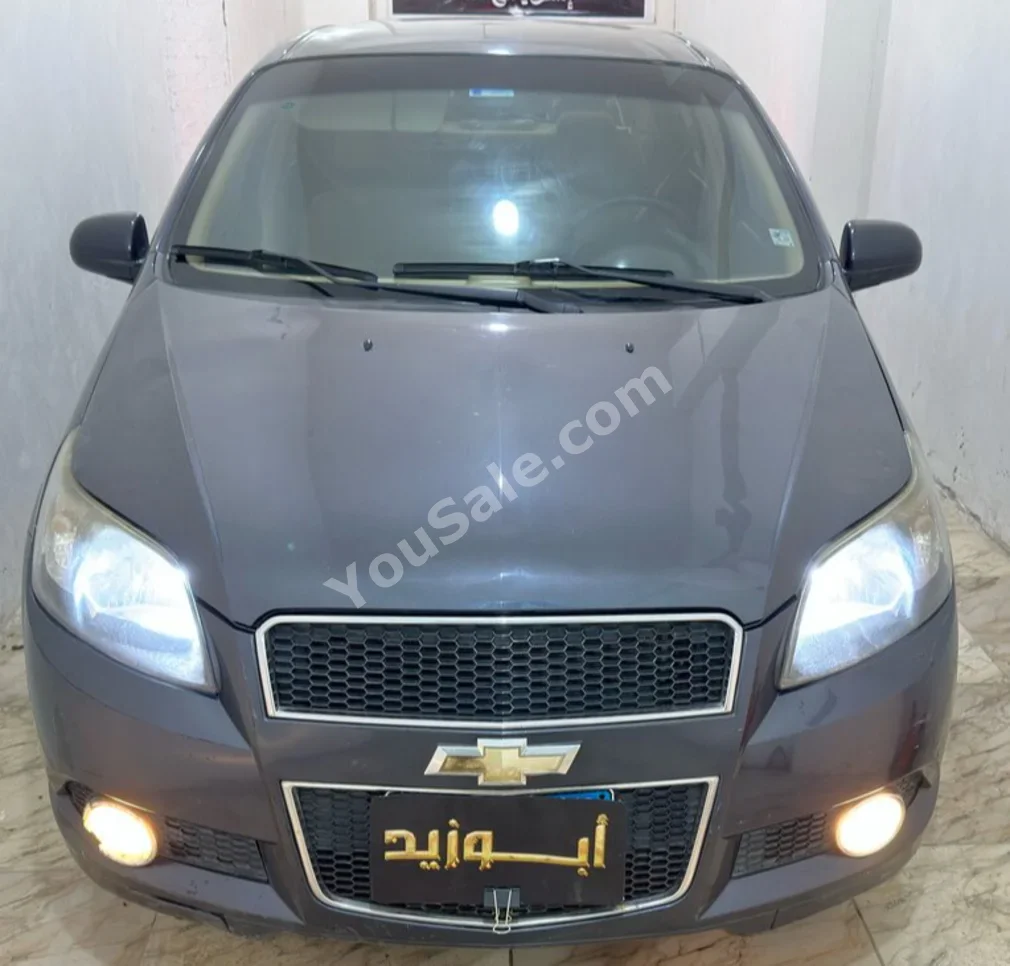Chevrolet  Aveo  2015  Sedan  Automatic  4 Cylinder  140,000 Km  FWD  Green  Gasoline