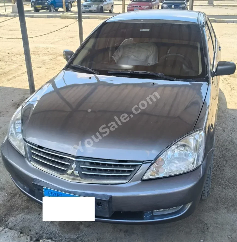 متسوبيشي  لانسر  2007  سيدان  اوتوماتيك  4 سلندر  219,000 كم  دفع أمامي  فضي  بنزين
