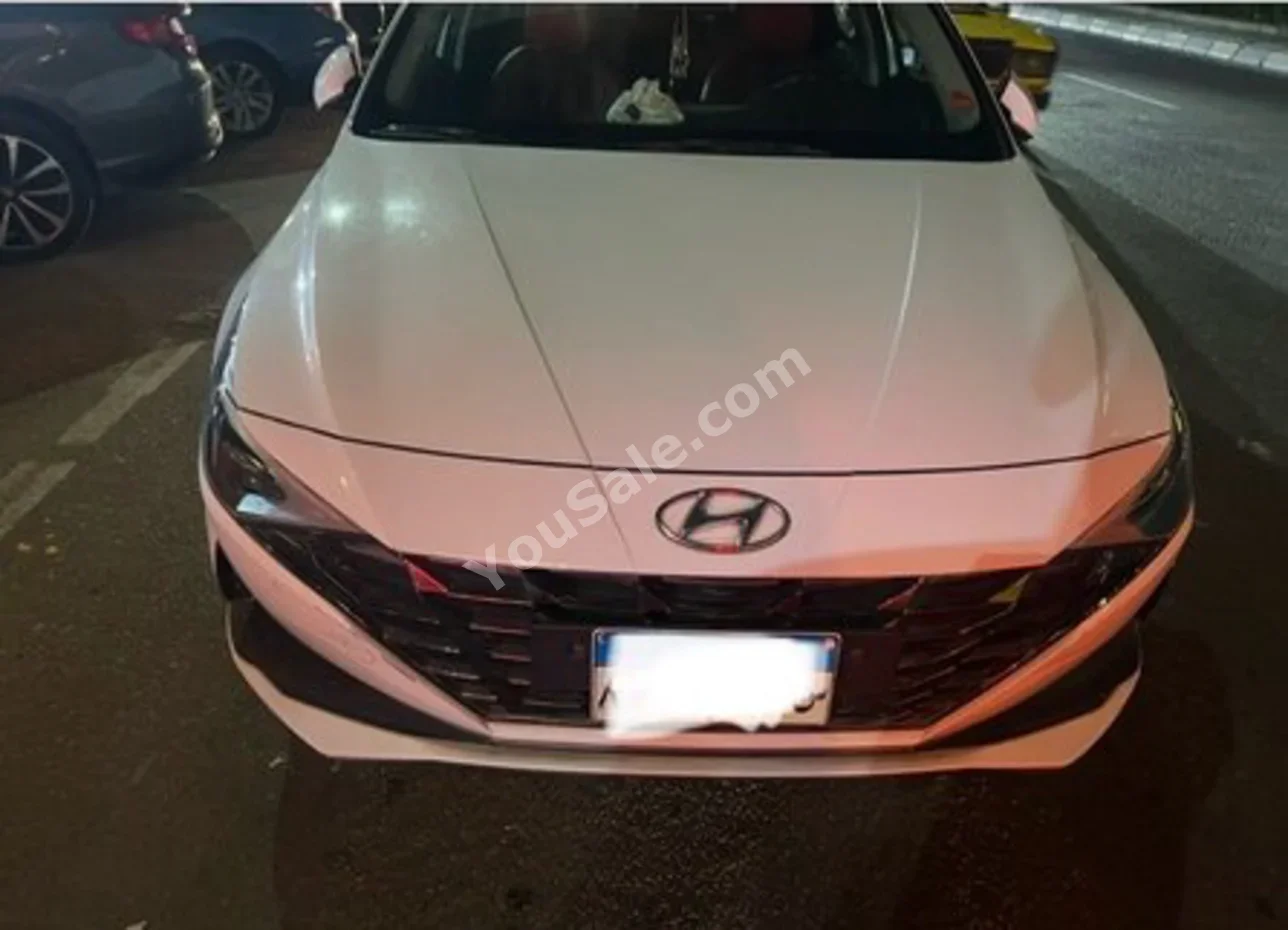 Hyundai  Elantra  2021  Sedan  Automatic  4 Cylinder  34,500 Km  FWD  White  Gasoline