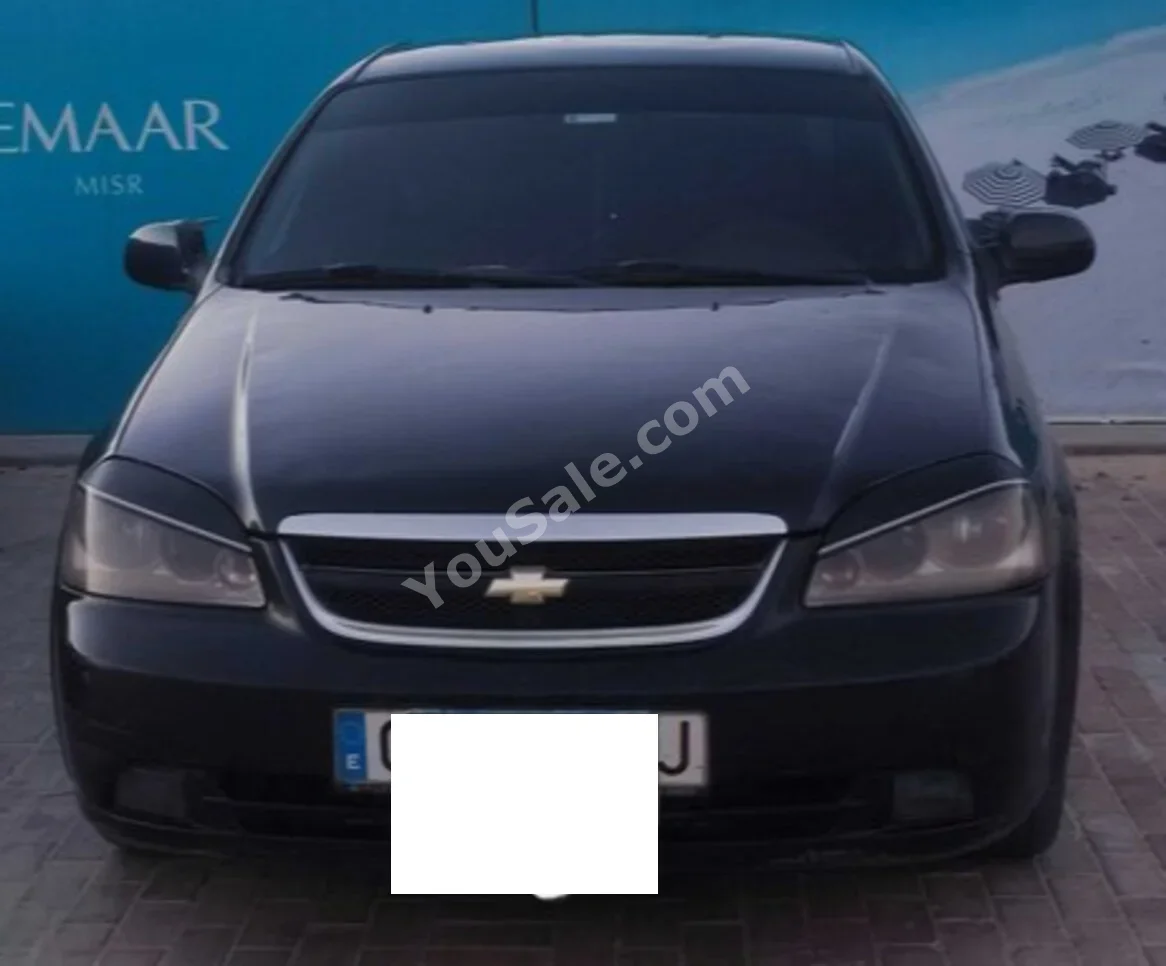 شفروليه  اوبترا  2011  سيدان  اوتوماتيك  4 سلندر  300,000 كم  دفع أمامي  أسود  بنزين