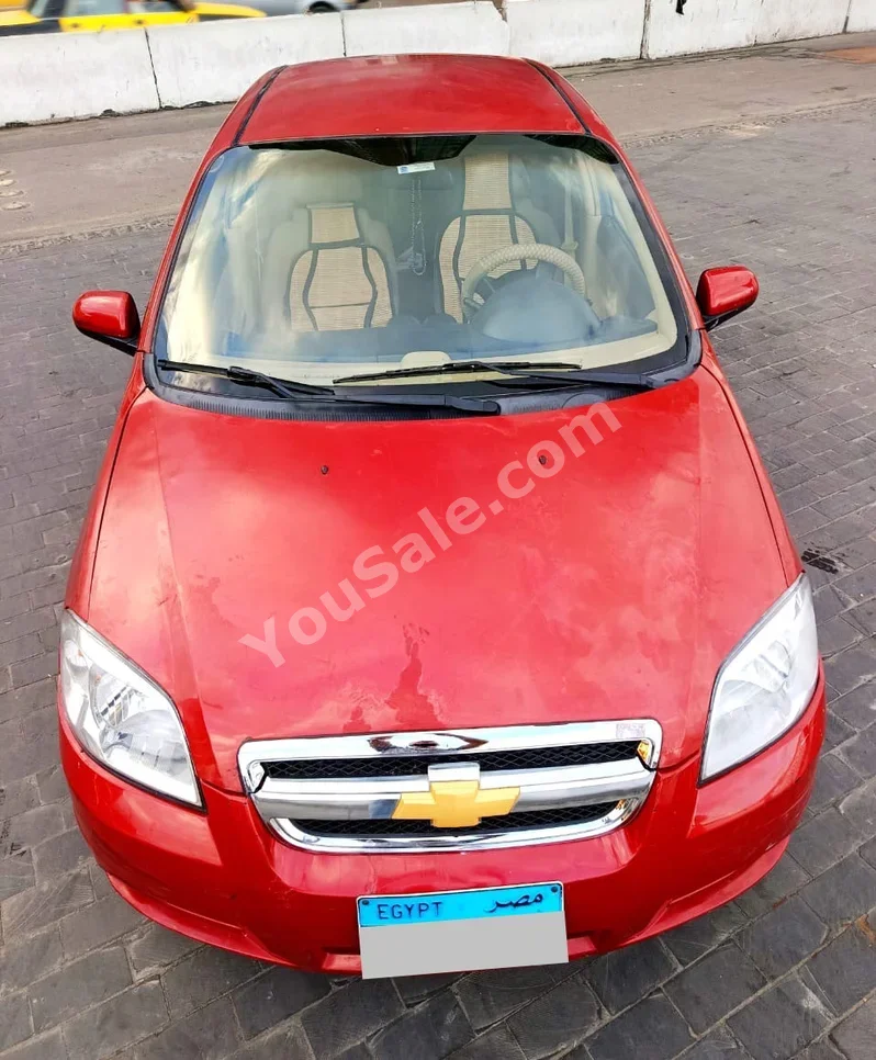 Chevrolet  Aveo  2014  Sedan  Automatic  4 Cylinder  80,000 Km  FWD  Red  Gasoline
