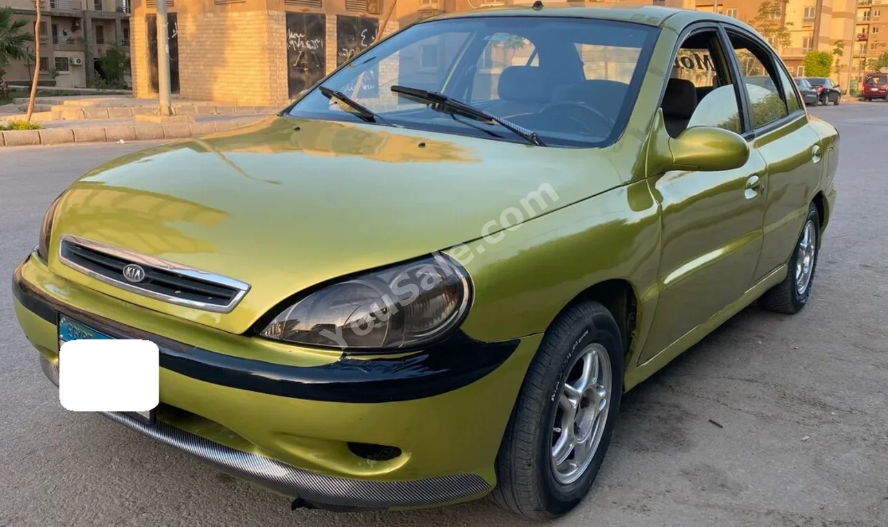 Kia  Rio  2001  Sedan  Manual  4 Cylinder  160,000 Km  FWD  Yellow  Gasoline