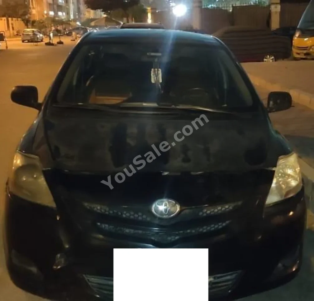 Toyota  Yaris  2007  Sedan  Manual  4 Cylinder  128,000 Km  FWD  Black  Gasoline