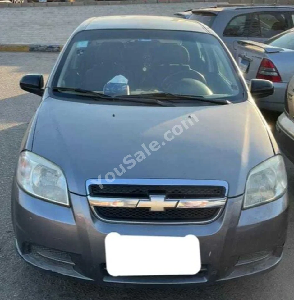 Chevrolet Aveo 2010 Sedan Manual 4 Cylinder 158,000 Km FWD Gray Metallic Gasoline