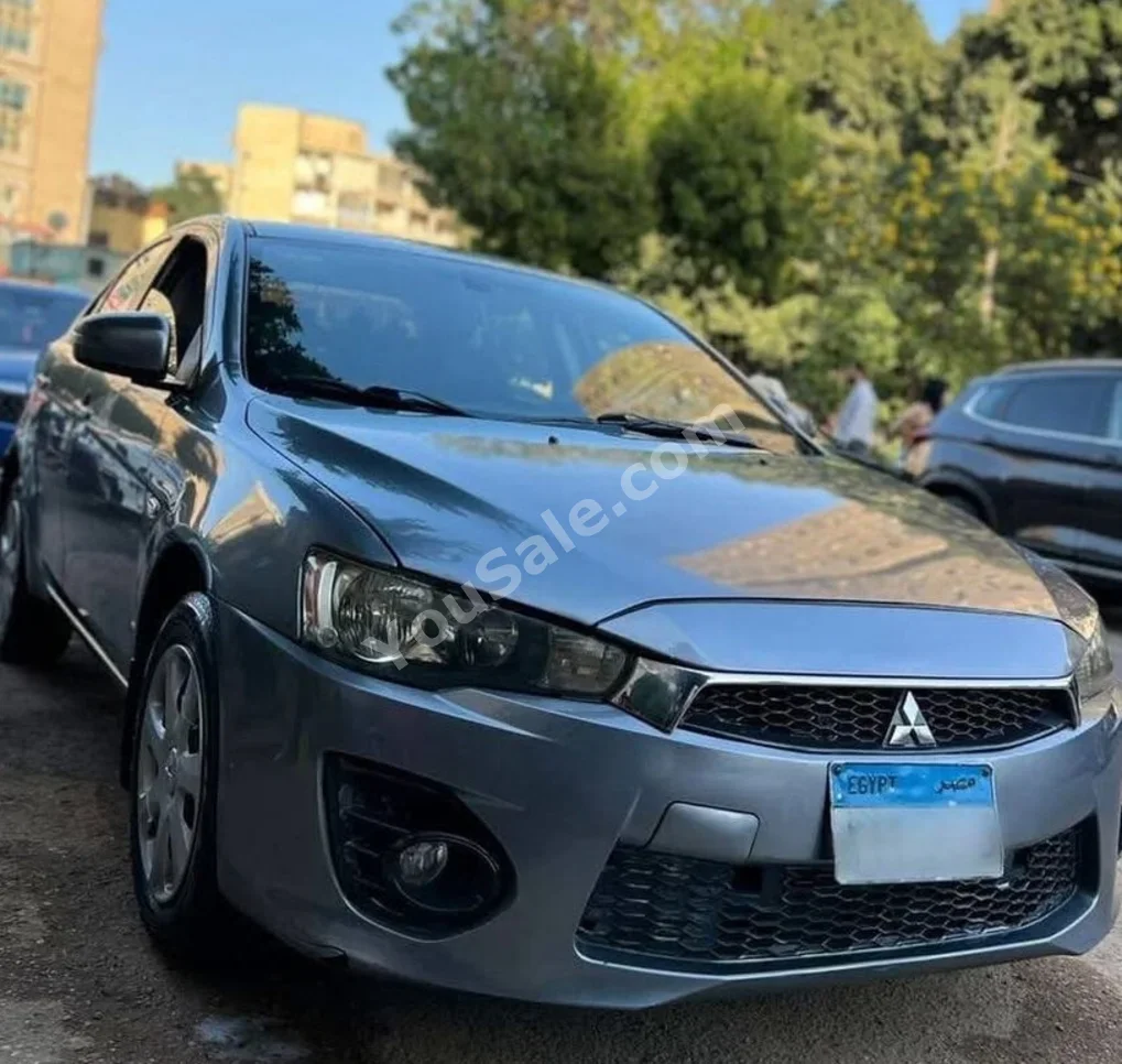 متسوبيشي  لانسر  2017  سيدان  اوتوماتيك  4 سلندر  100,000 كم  دفع أمامي  قرمزي  بنزين