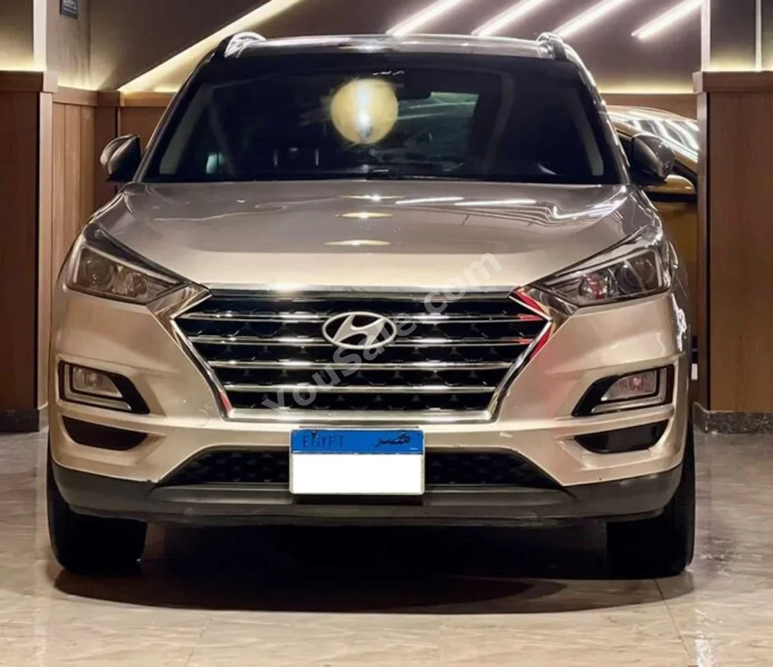Hyundai  Tucson  2019  Hatchback  Automatic  4 Cylinder  120,000 Km  FWD  Beige  Gasoline