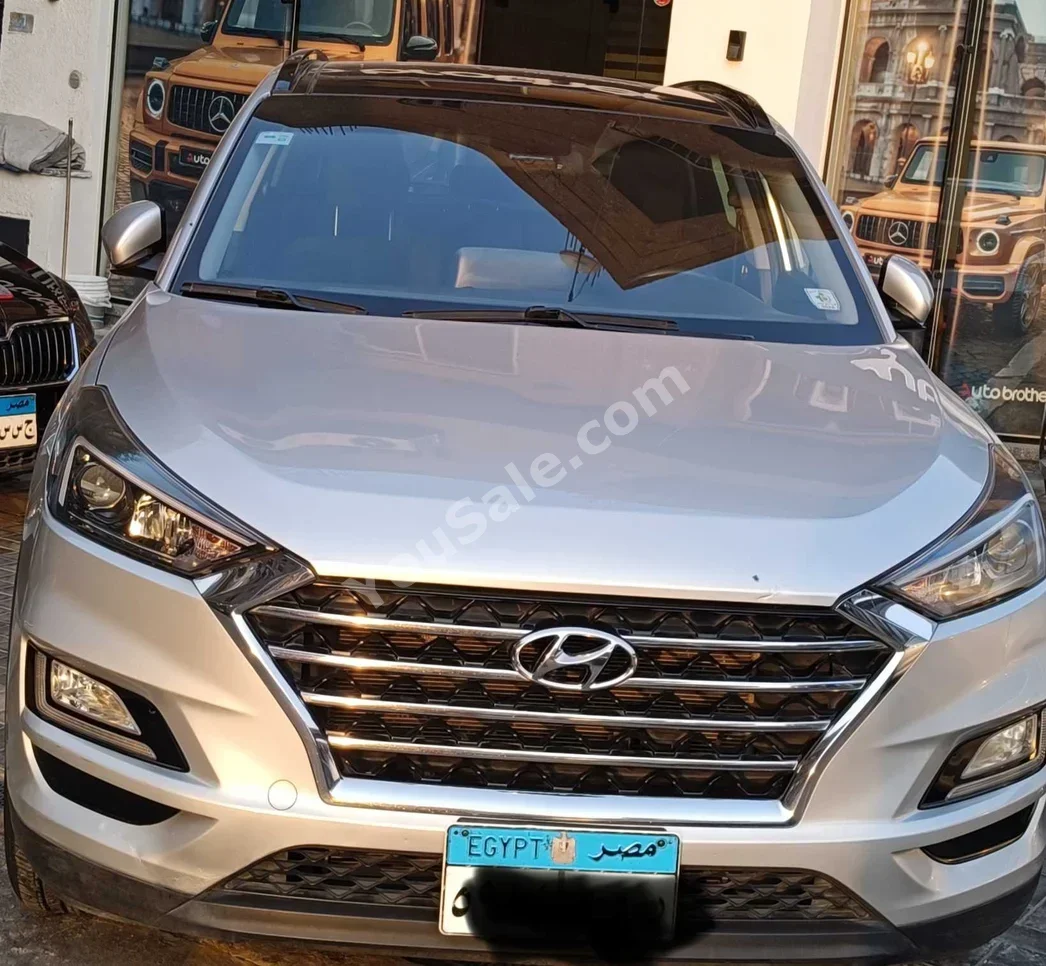 Hyundai Tucson 2021 SUV Automatic 4 Cylinder 100,000 Km FWD Silver Gasoline