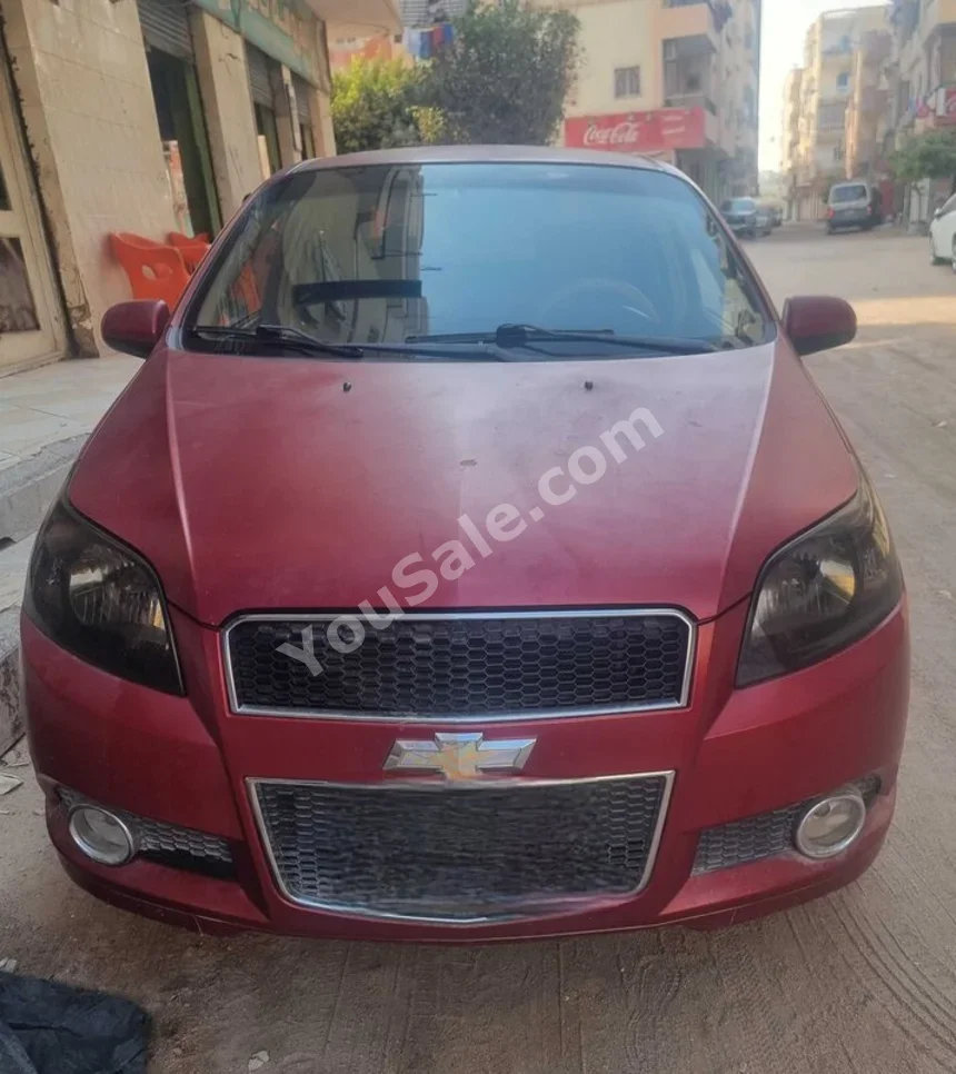 Chevrolet  Aveo  2014  Sedan  Automatic  4 Cylinder  130,000 Km  FWD  Red  Gasoline