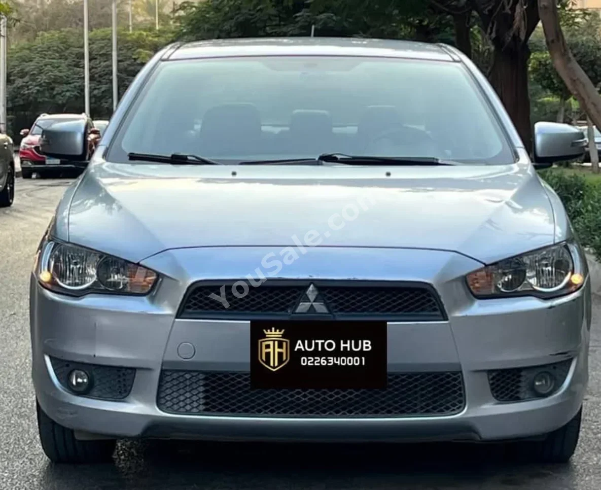 Mitsubishi Lancer 2015 Sedan Automatic 4 Cylinder 70,000 Km FWD Silver Gasoline