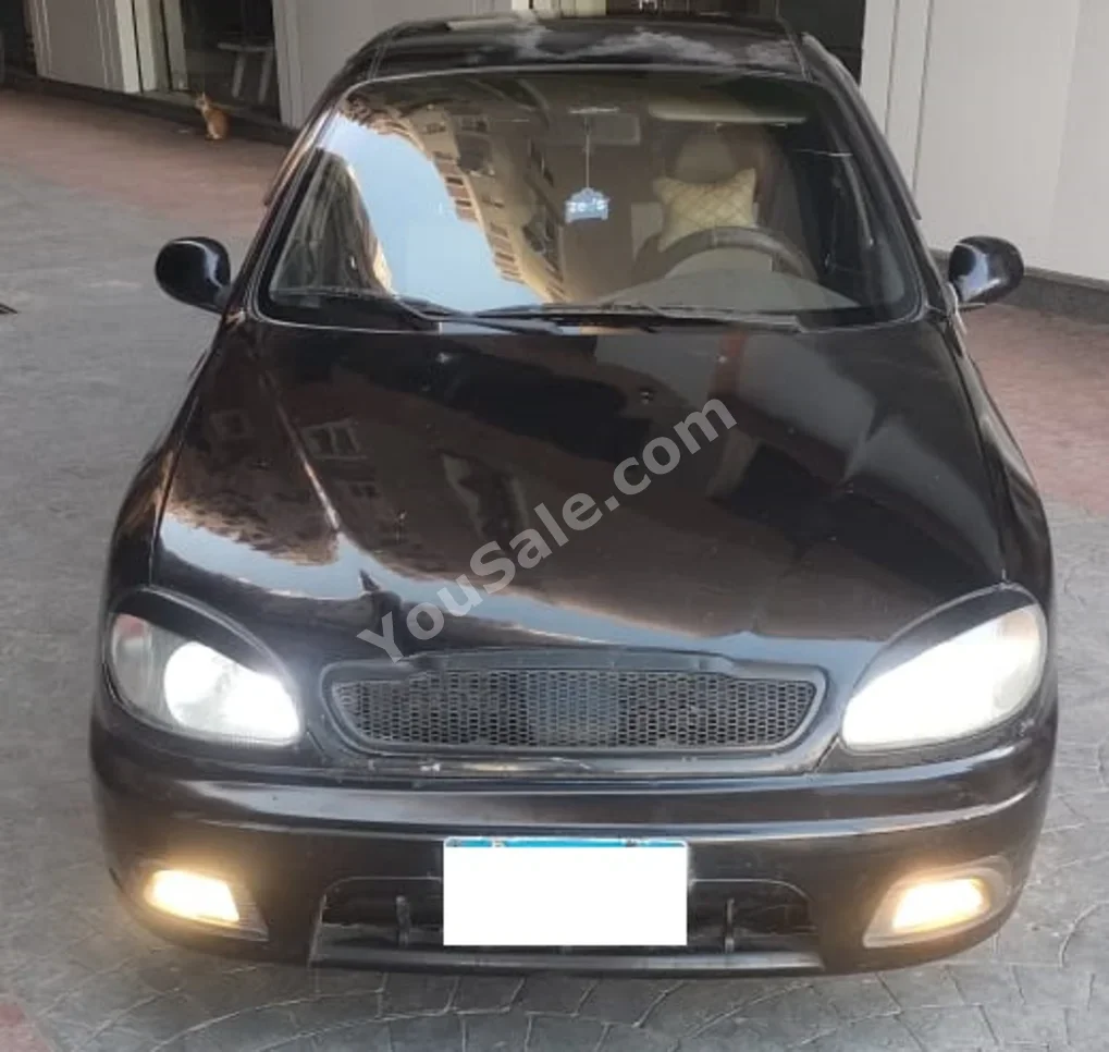 Chevrolet  Lanos  2010  Sedan  Manual  4 Cylinder  140,000 Km  FWD  Black  Gasoline