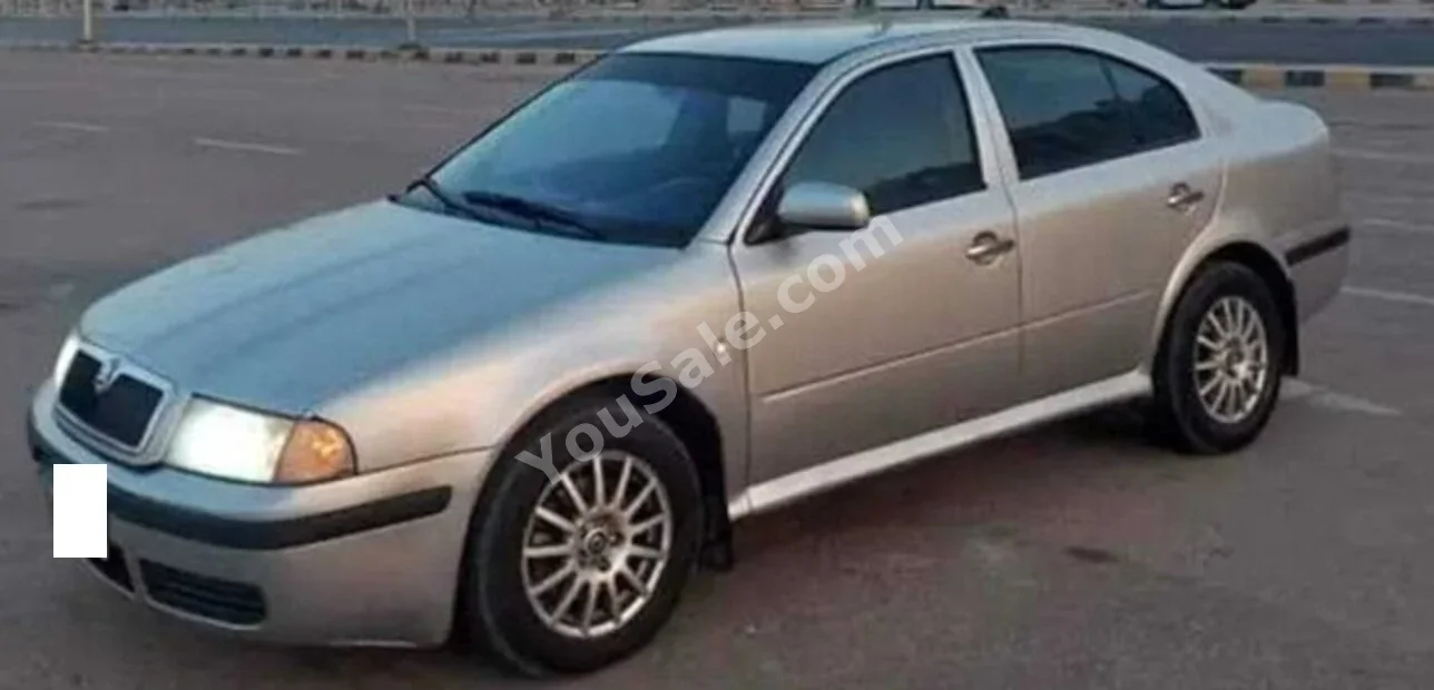 سكودا أوكتافيا 2006 سيدان اوتوماتيك 4 سلندر 200,000 كم دفع أمامي فضي بنزين