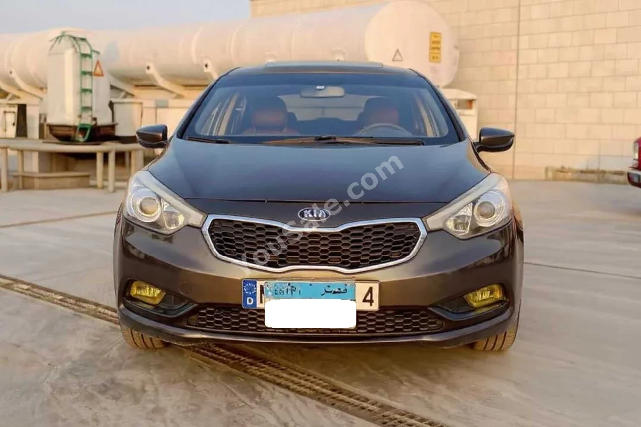 Kia Cerato 2015 Sedan Automatic 4 Cylinder 170,000 Km AWD Brown Gasoline