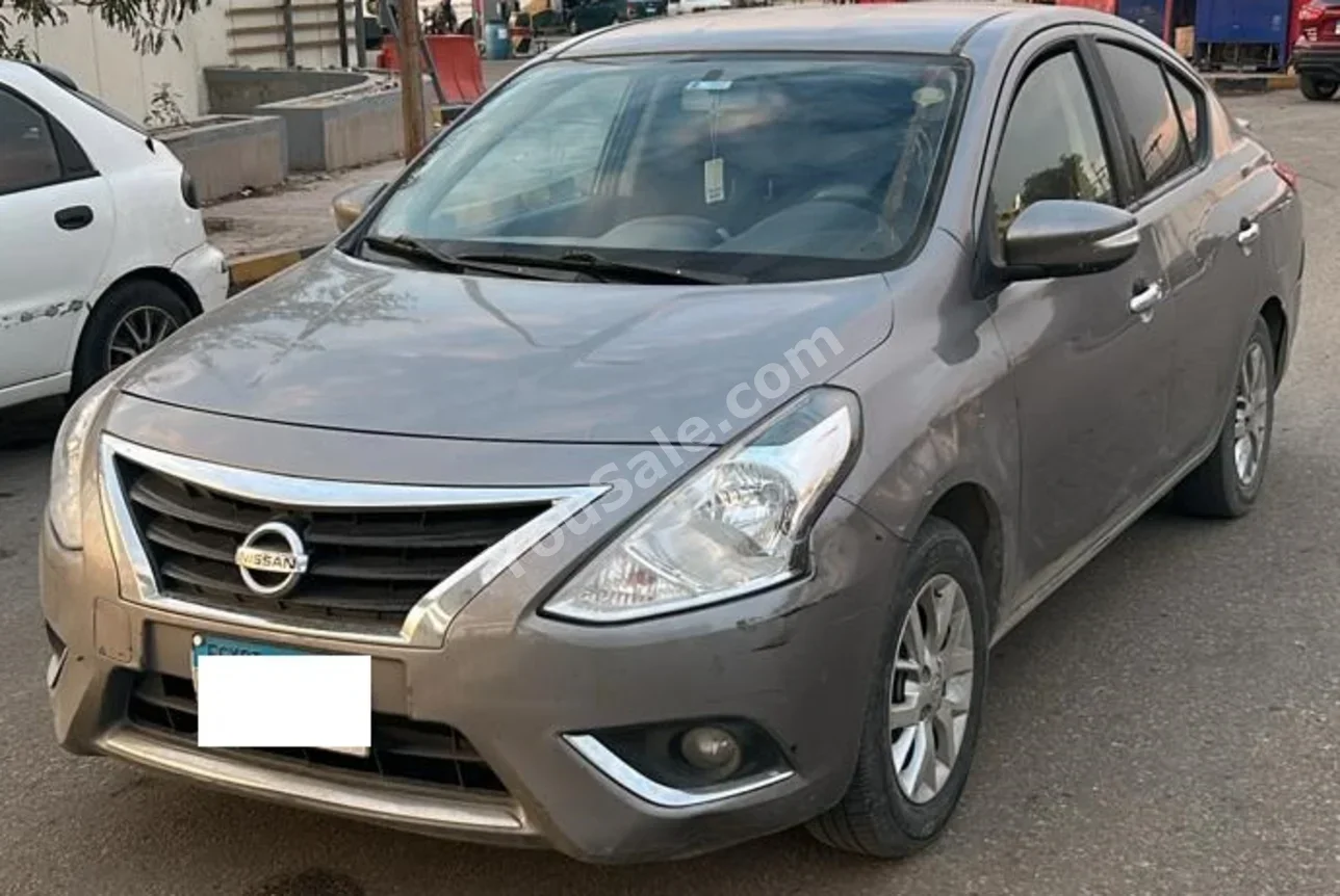 Nissan  Sunny  2022  Sedan  Automatic  4 Cylinder  95,000 Km  FWD  Silver  Gasoline