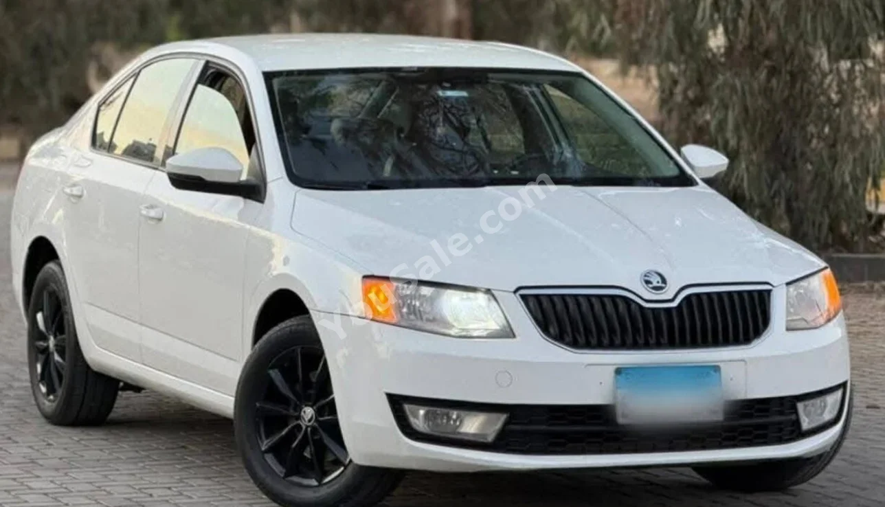 Skoda  Octavia  2015  Sedan  Automatic  4 Cylinder  100,000 Km  FWD  White  Gasoline