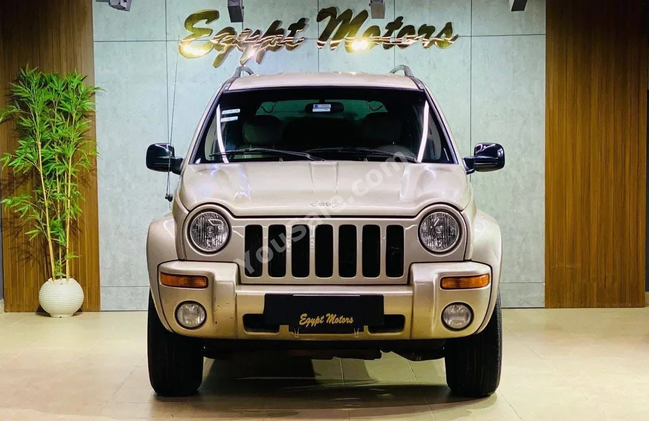 Jeep  Cherokee  2002  SUV  Automatic  4 Cylinder  100,000 Km  RWD  Beige  Gasoline