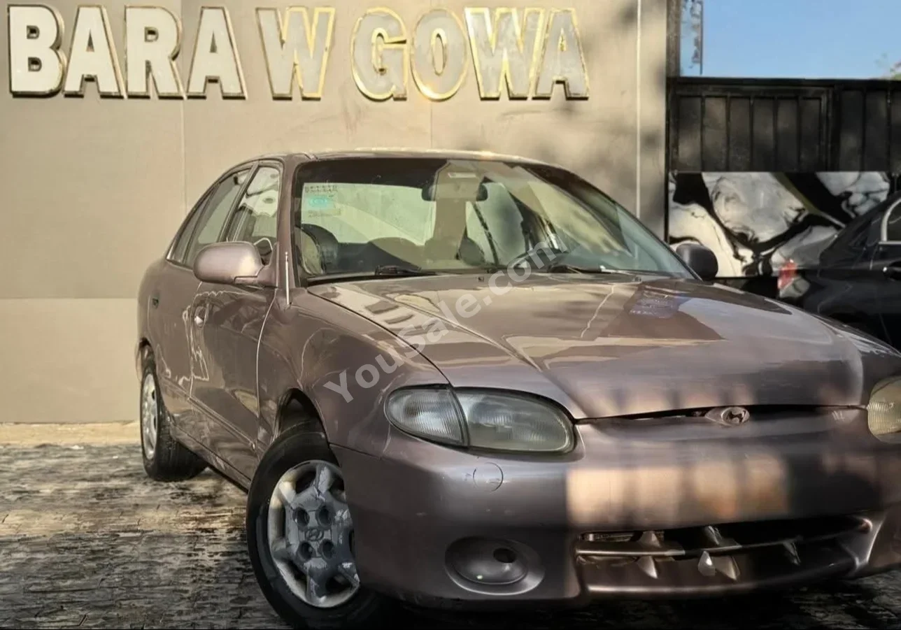 Hyundai  Accent  2002  Sedan  Automatic  4 Cylinder  180,000 Km  FWD  Pink  Gasoline