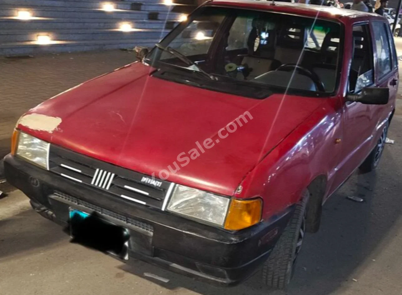 Fiat  2000  2000  Hatchback  Manual  4 Cylinder  132,000 Km  FWD  Red  Gasoline