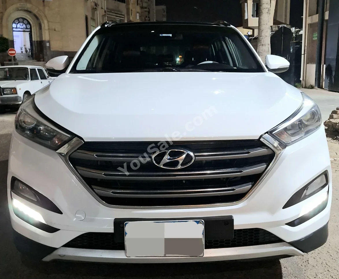 هيونداي  توسان  2019  هاتشباك  اوتوماتيك  4 سلندر  125,000 كم  دفع رباعي  أبيض  بنزين
