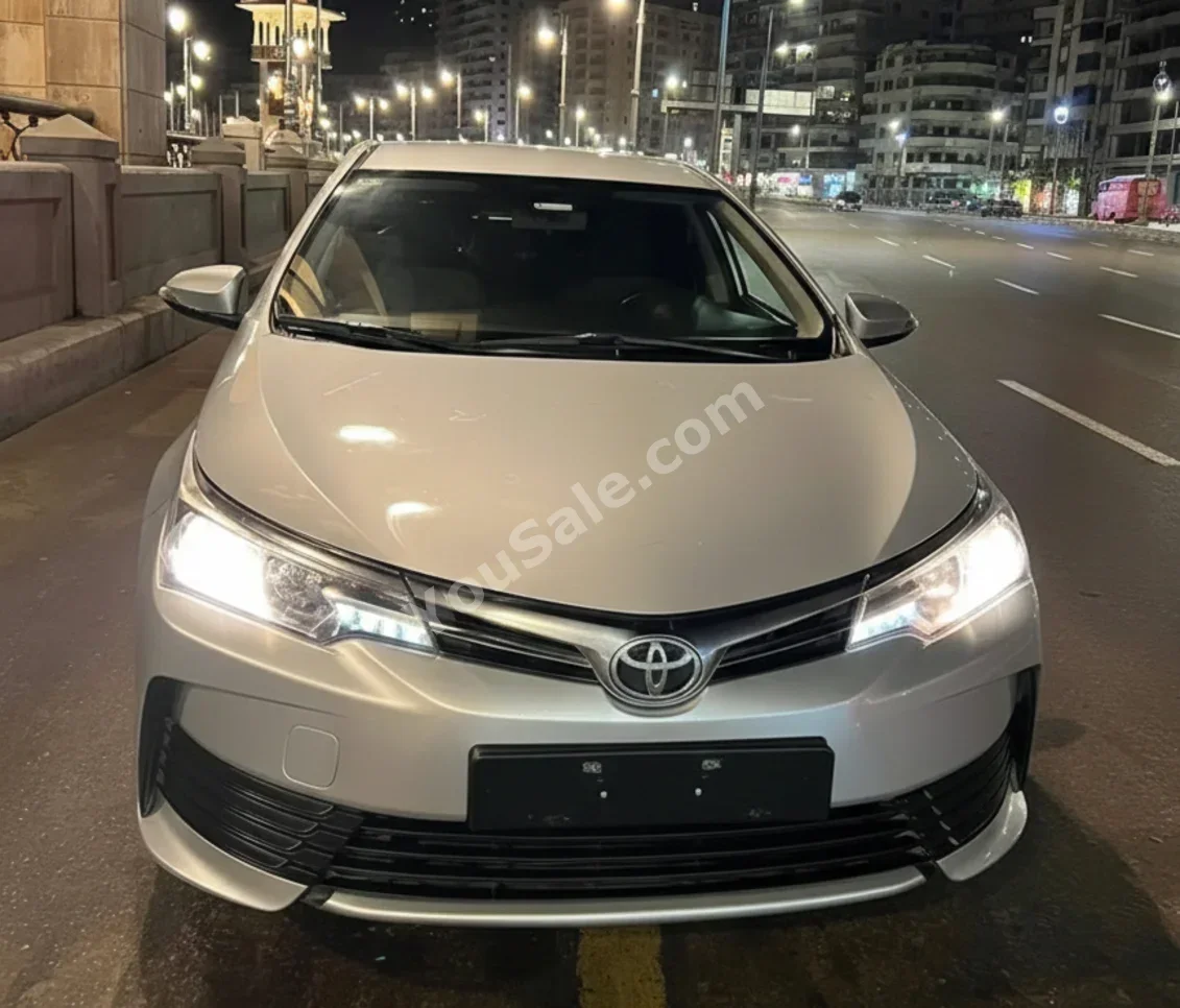 تويوتا كورولا 2019 اوتوماتيك 100,000 كم دفع أمامي فضي بنزين