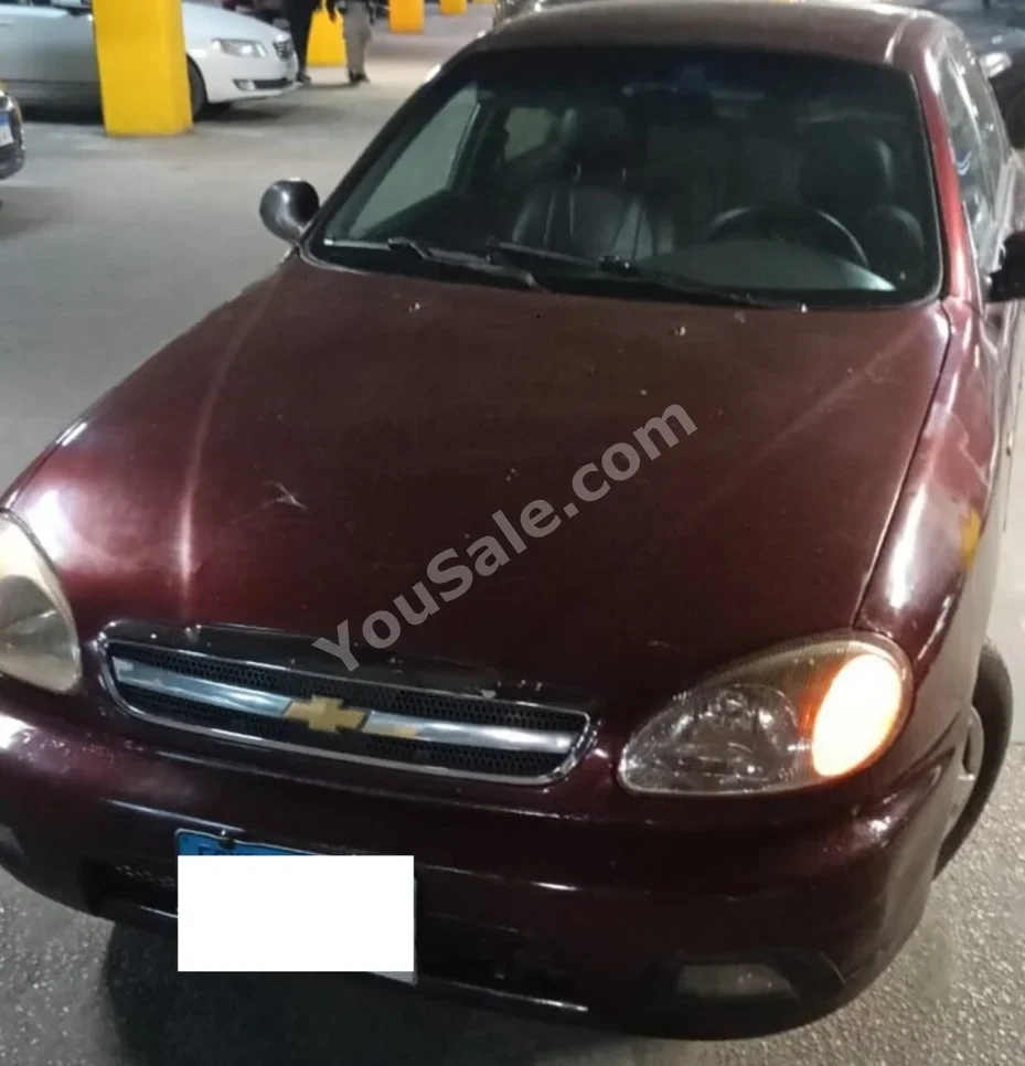 شفروليه لانوس 2012 سيدان عادي 265,000 كم دفع خلفي أحمر غامق بنزين
