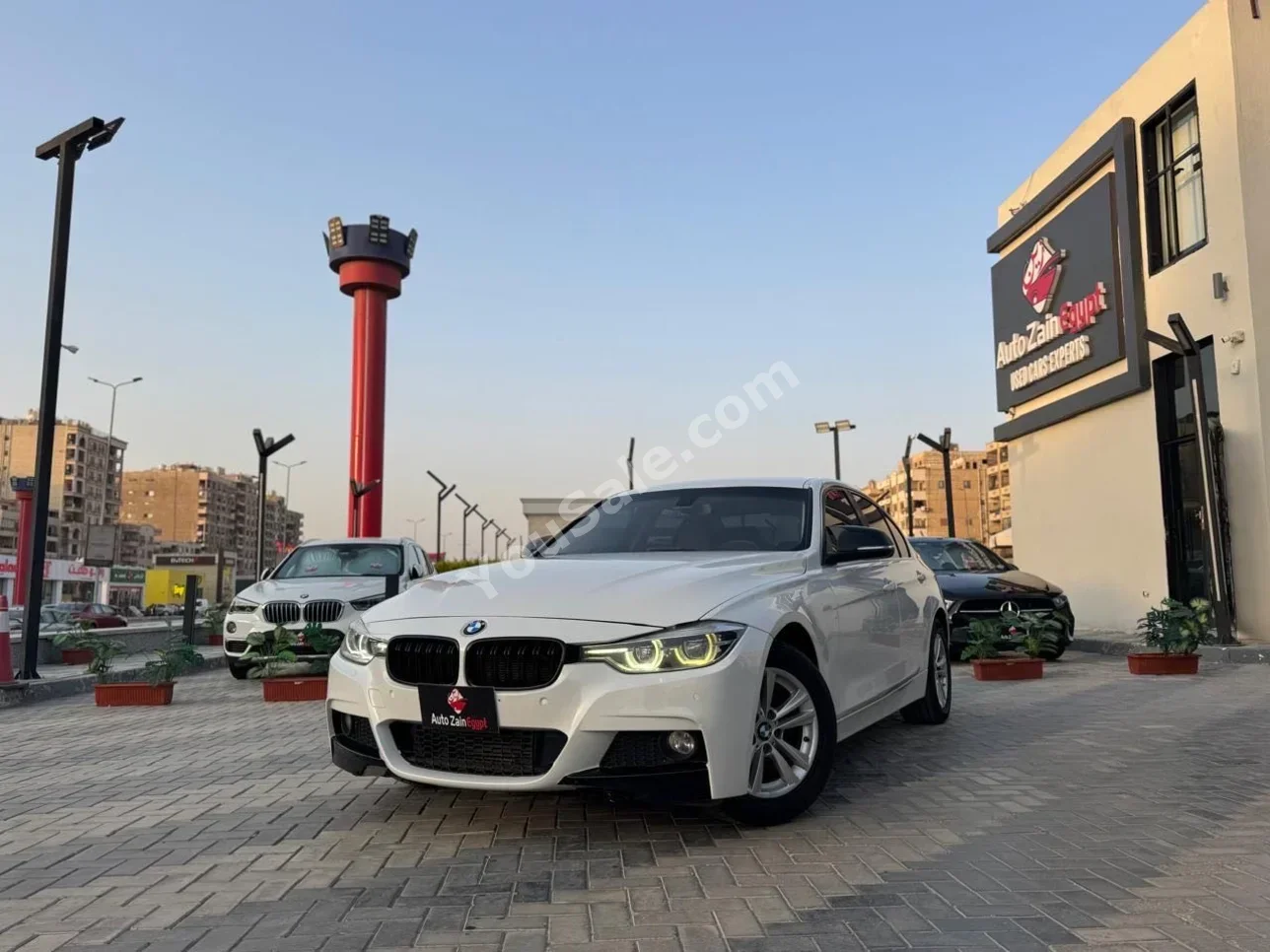 BMW  3-Series  318i  2018  Sedan  Automatic  180,000 Km  FWD  White  Gasoline