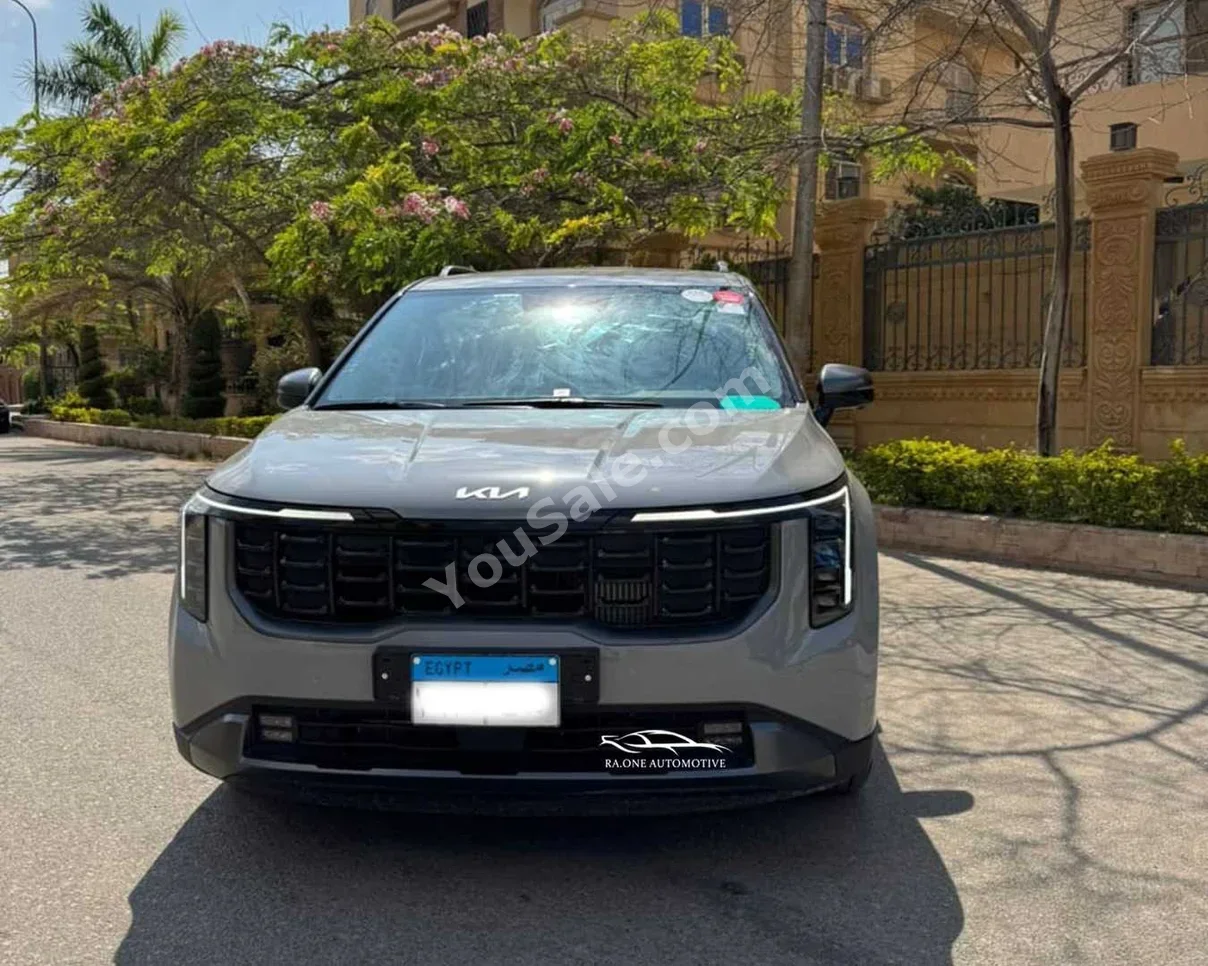كيا  كي في 6  2025  كشف  اوتوماتيك  30,000 كم  دفع رباعي  رمادي  بنزين