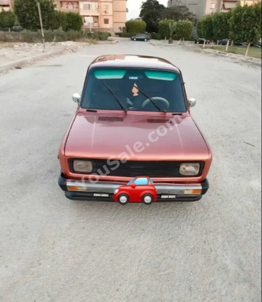 فيات  128  1985  سيدان  عادي  4 سلندر  244,000 كم  دفع أمامي  نحاسي  بنزين
