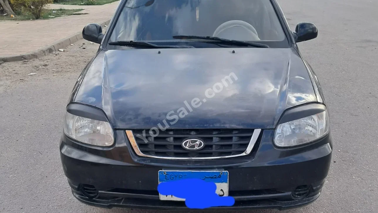 هيونداي فيرنا 2009 عادي 300,000 كم أسود بنزين