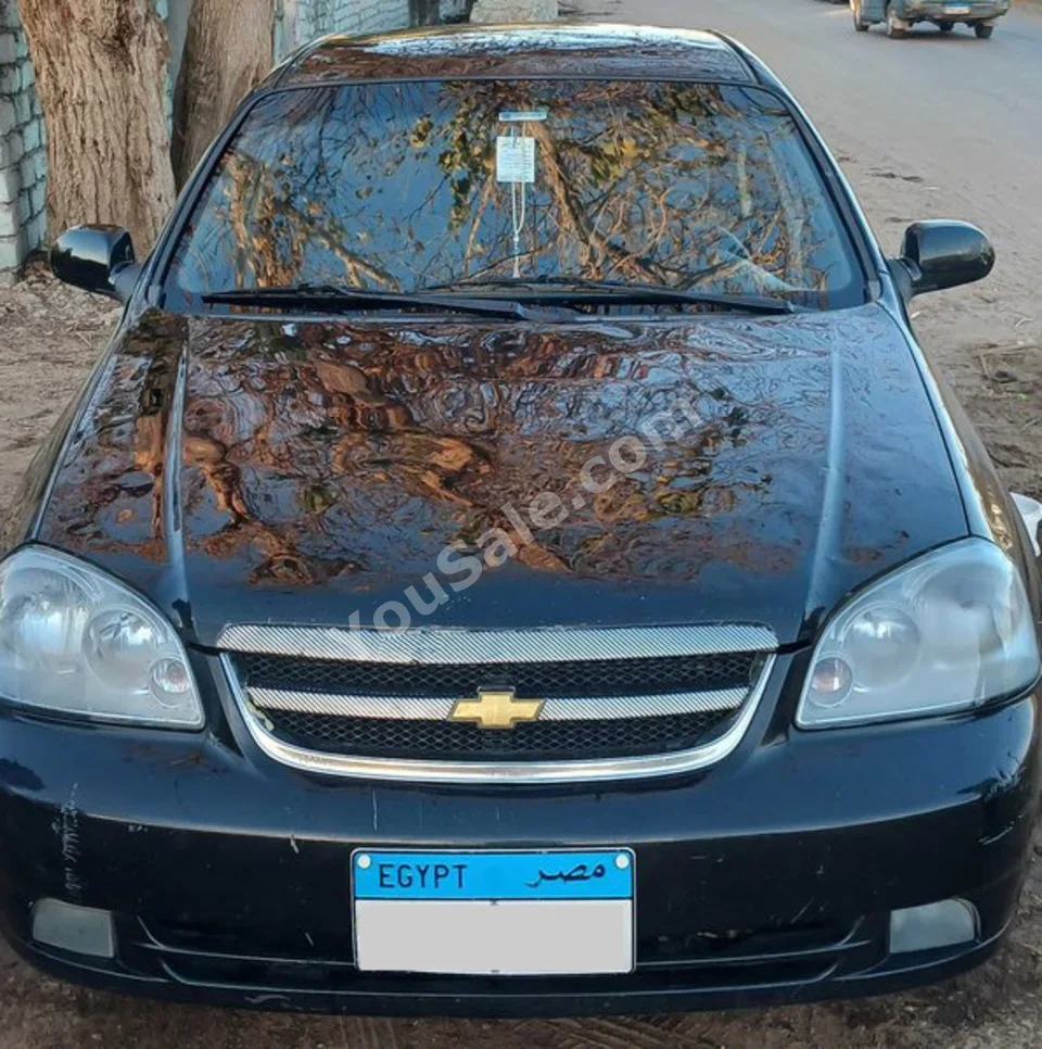 شفروليه  اوبترا  2012  سيدان  اوتوماتيك  310,000 كم  دفع أمامي  أسود  بنزين