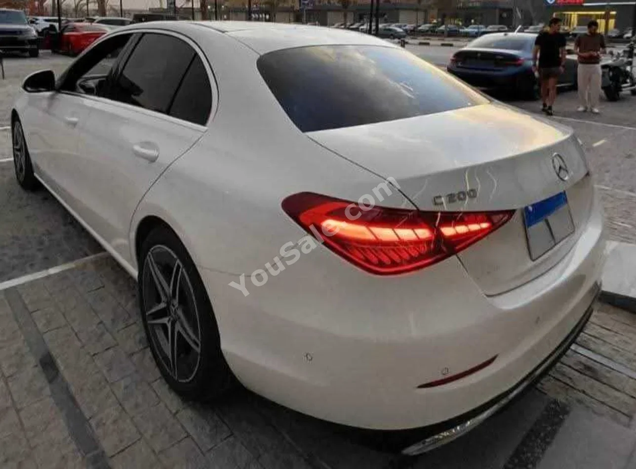 مرسيدس - بنز  سي - كلاس  200  2022  سيدان  اوتوماتيك  53,000 كم  أبيض لؤلؤي  بنزين