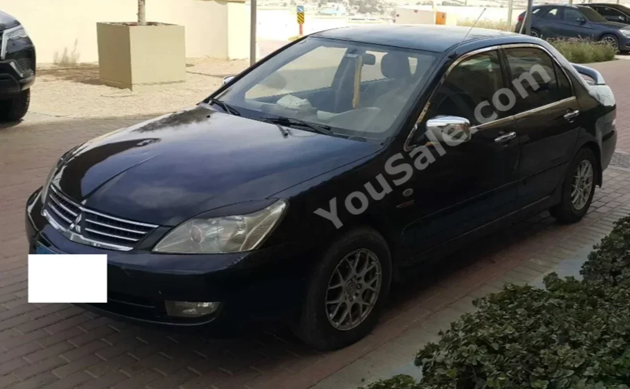 Mitsubishi  Lancer  2009  Sedan  Manual  280,000 Km  FWD  Black  Gasoline