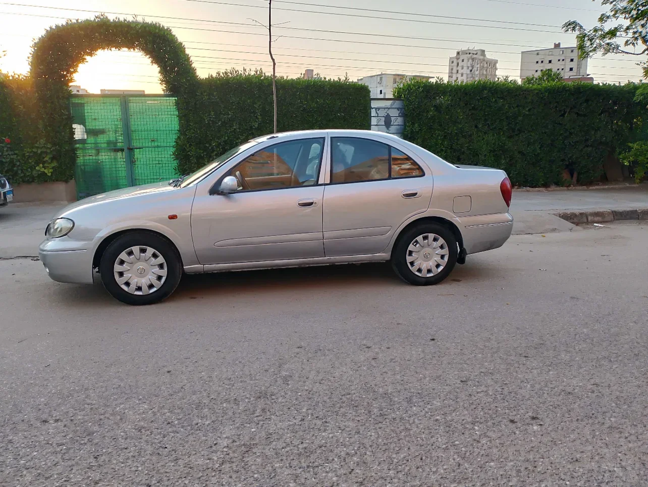 Nissan  Sunny  2004  Sedan  Automatic  4 Cylinder  400 Km  FWD  Silver  Gasoline