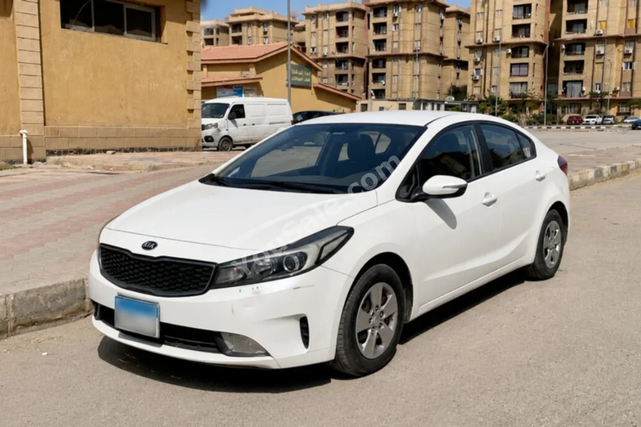 Kia  Cerato  2018  Sedan  Automatic  4 Cylinder  140,000 Km  FWD  White  Gasoline
