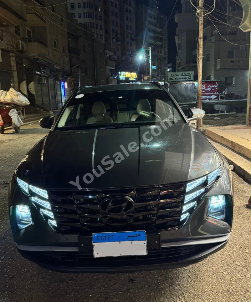 Hyundai  Tucson  2021  SUV  Automatic  82,000 Km  FWD  Dark Gray  Gasoline