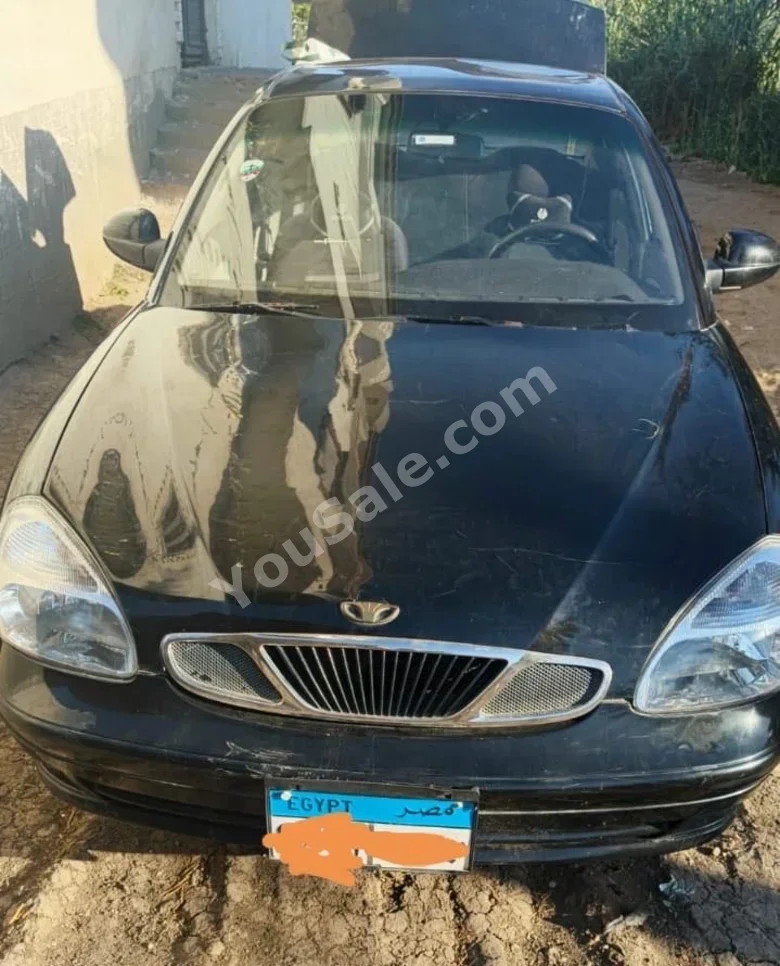دايو  نوبيرا  2005  عادي  300,000 كم  ازرق  بنزين
