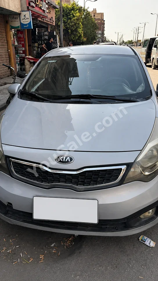 Kia  Rio  2014  Sedan  Automatic  4 Cylinder  119,000 Km  FWD  Silver  Gasoline