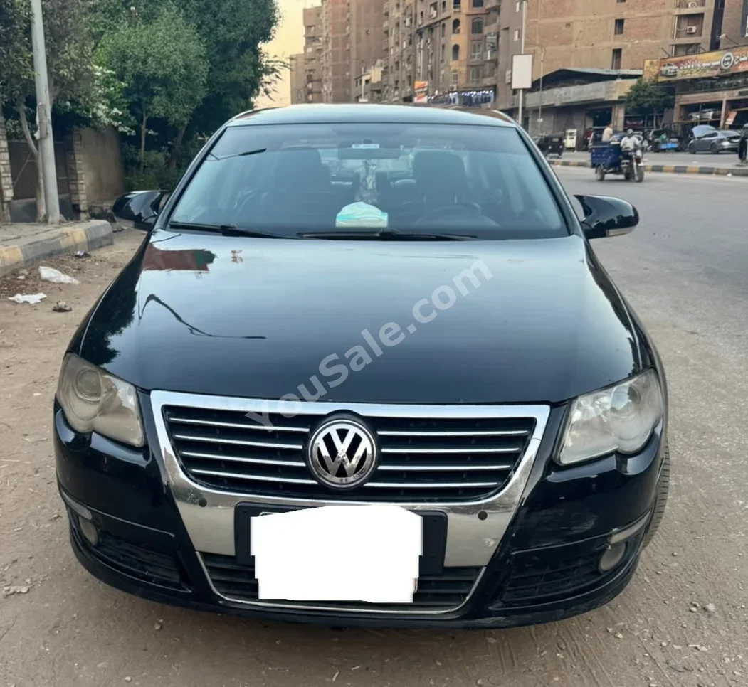 فولكس فاجن  باسات  2010  اوتوماتيك  250,000 كم  أسود  بنزين