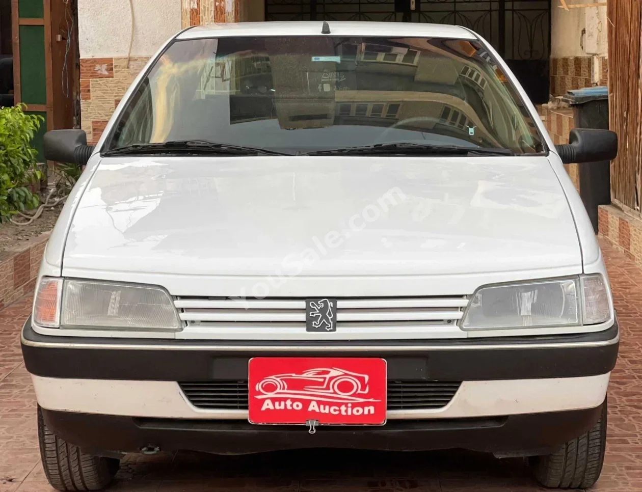 بيجو  405  1994  عادي  100,000 كم  أبيض  بنزين