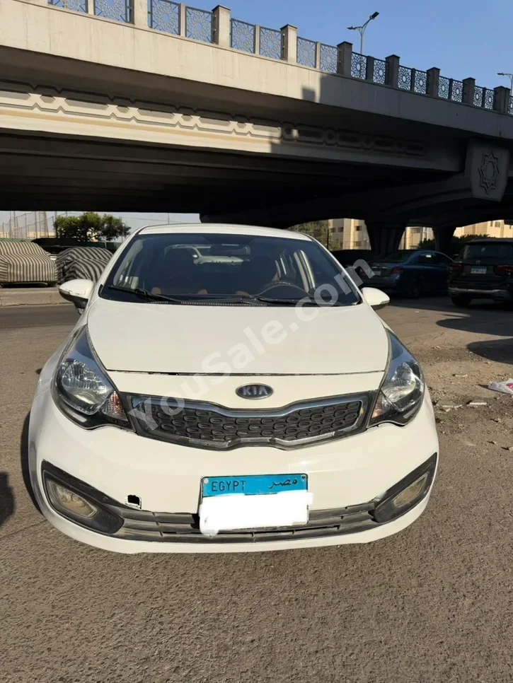 Kia  Rio  2013  Sedan  Automatic  4 Cylinder  160,000 Km  FWD  White  Gasoline